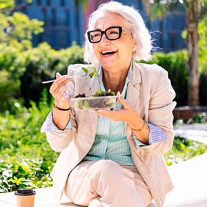 Lady enjoys salad