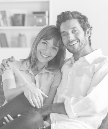 Man and woman sitting and smiling