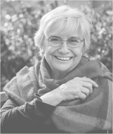 Senior woman with glasses smiling
